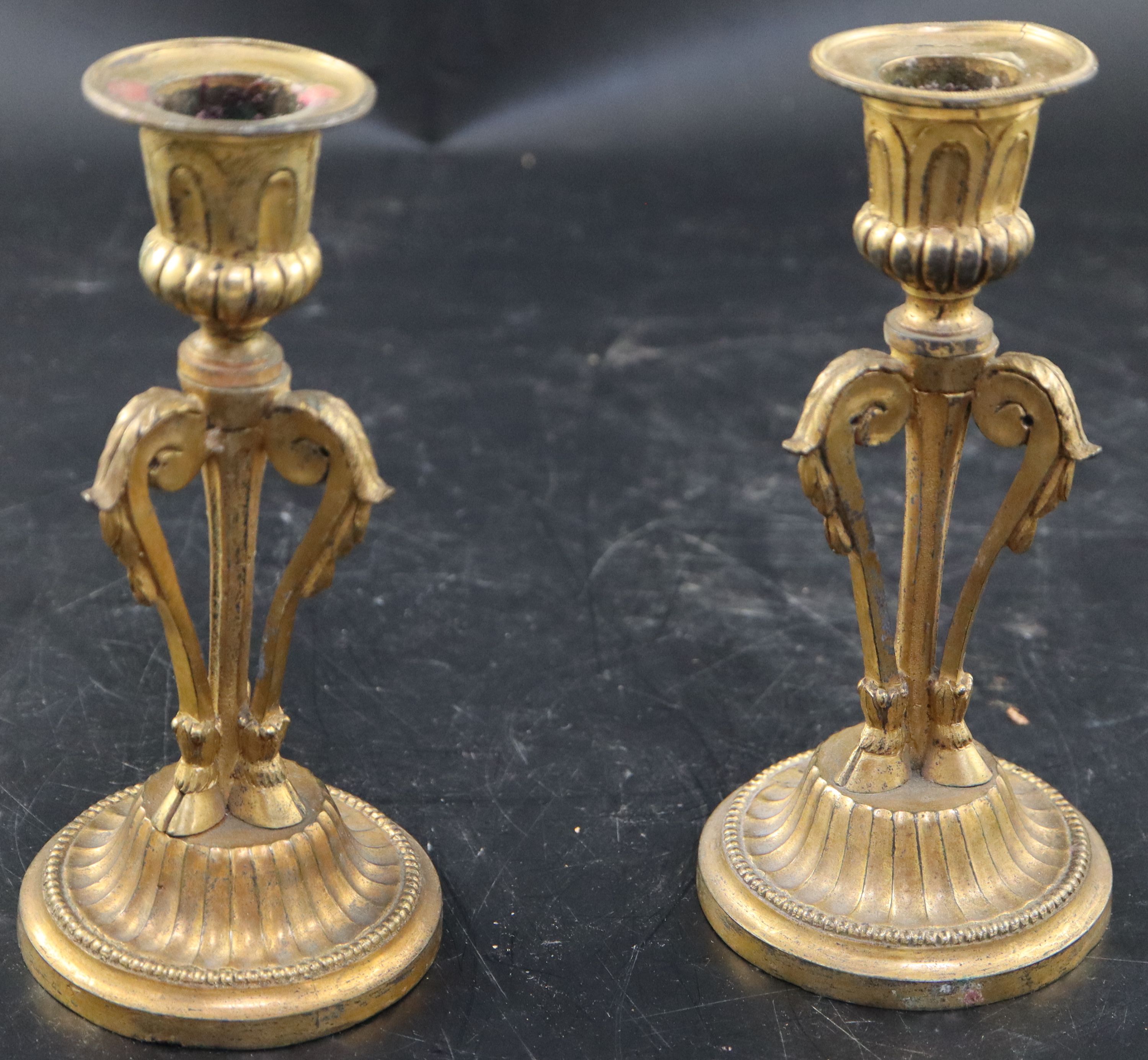 A pair of 19th century French ormolu candlesticks, height 17cm
